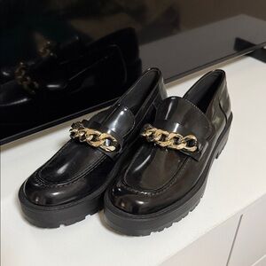 Zara Glossy Black Loafers with Gold Chain Accent